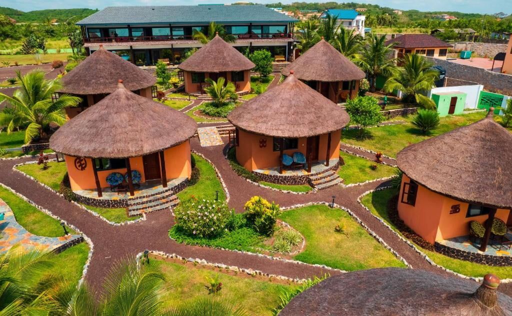 Thatched roundhouse suites in a garden