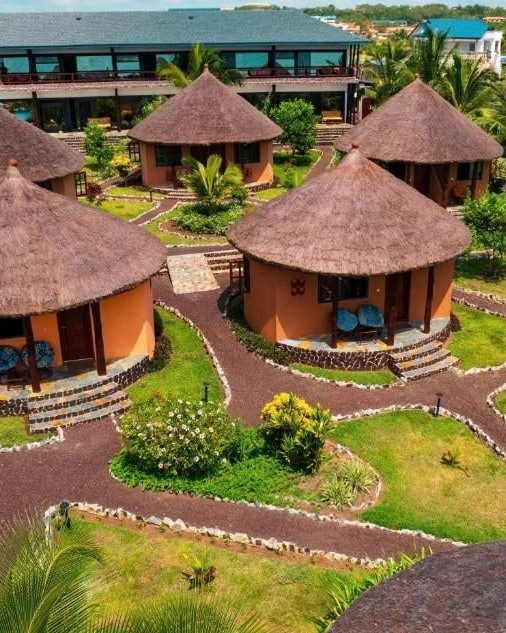 Lodges among palms in Ghana